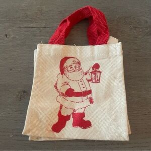 Mini Festive Santa Cloth Gift Bag with Red Handles